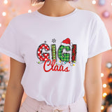 a woman wearing a white t - shirt with the word guli claus printed on