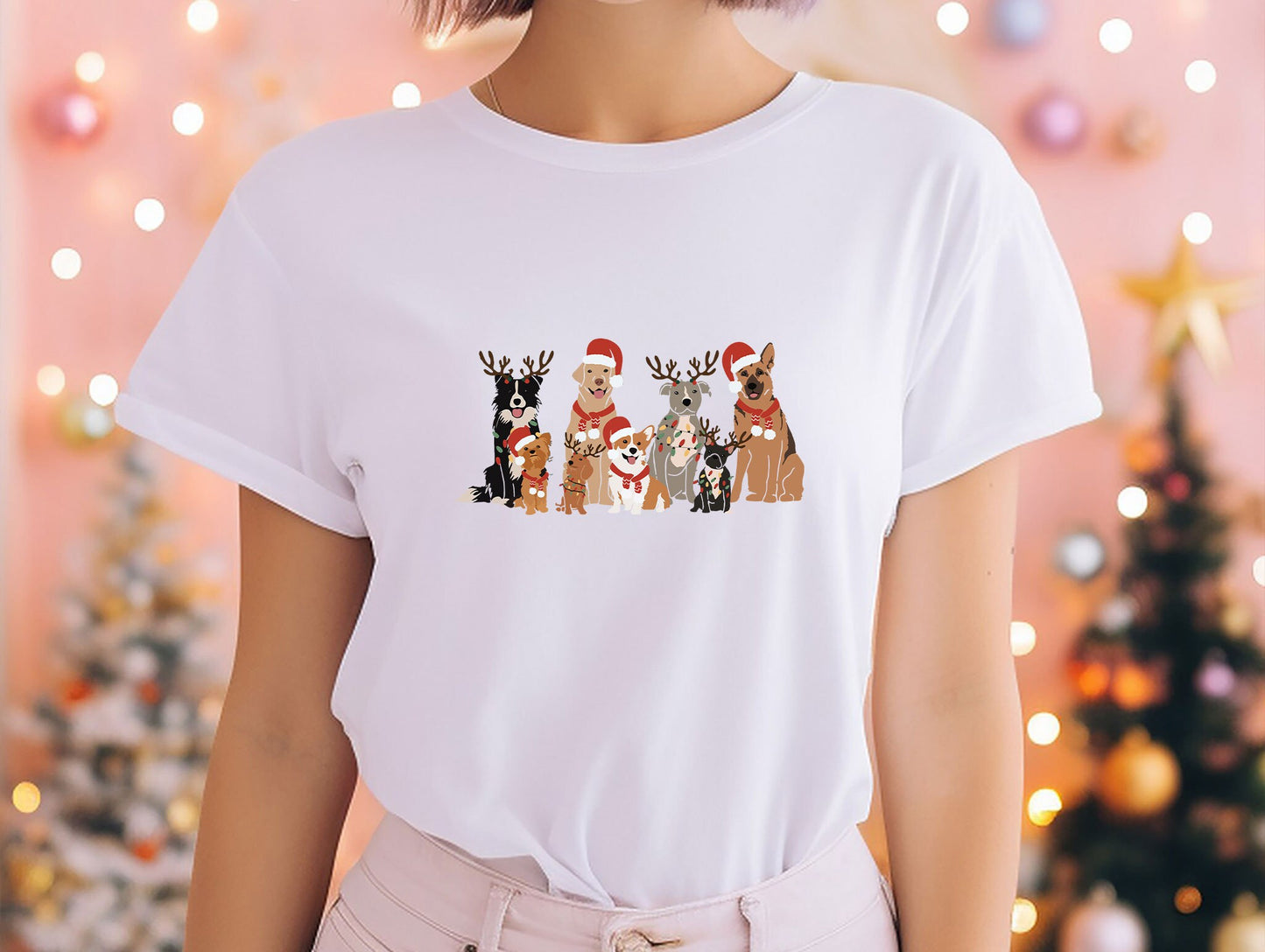 a woman wearing a white t - shirt with dogs on it