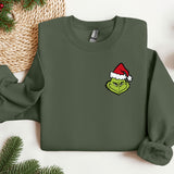 a green sweatshirt with a christmas hat on it