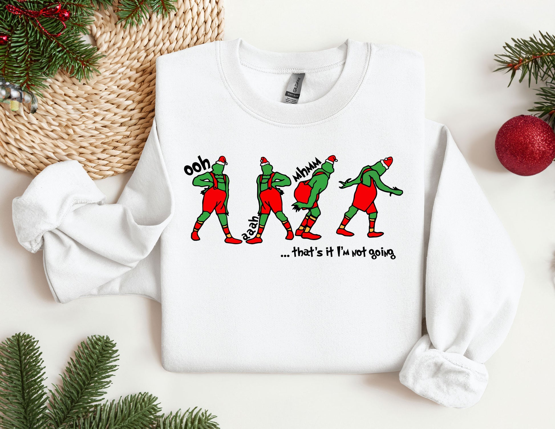 a group of three elfs on a white shirt