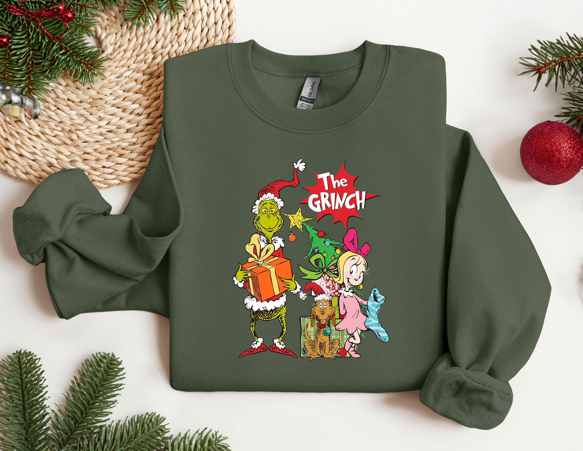 a green sweatshirt with the grinch on it