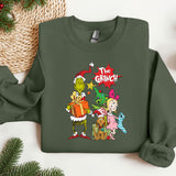 a green sweatshirt with the grinch on it