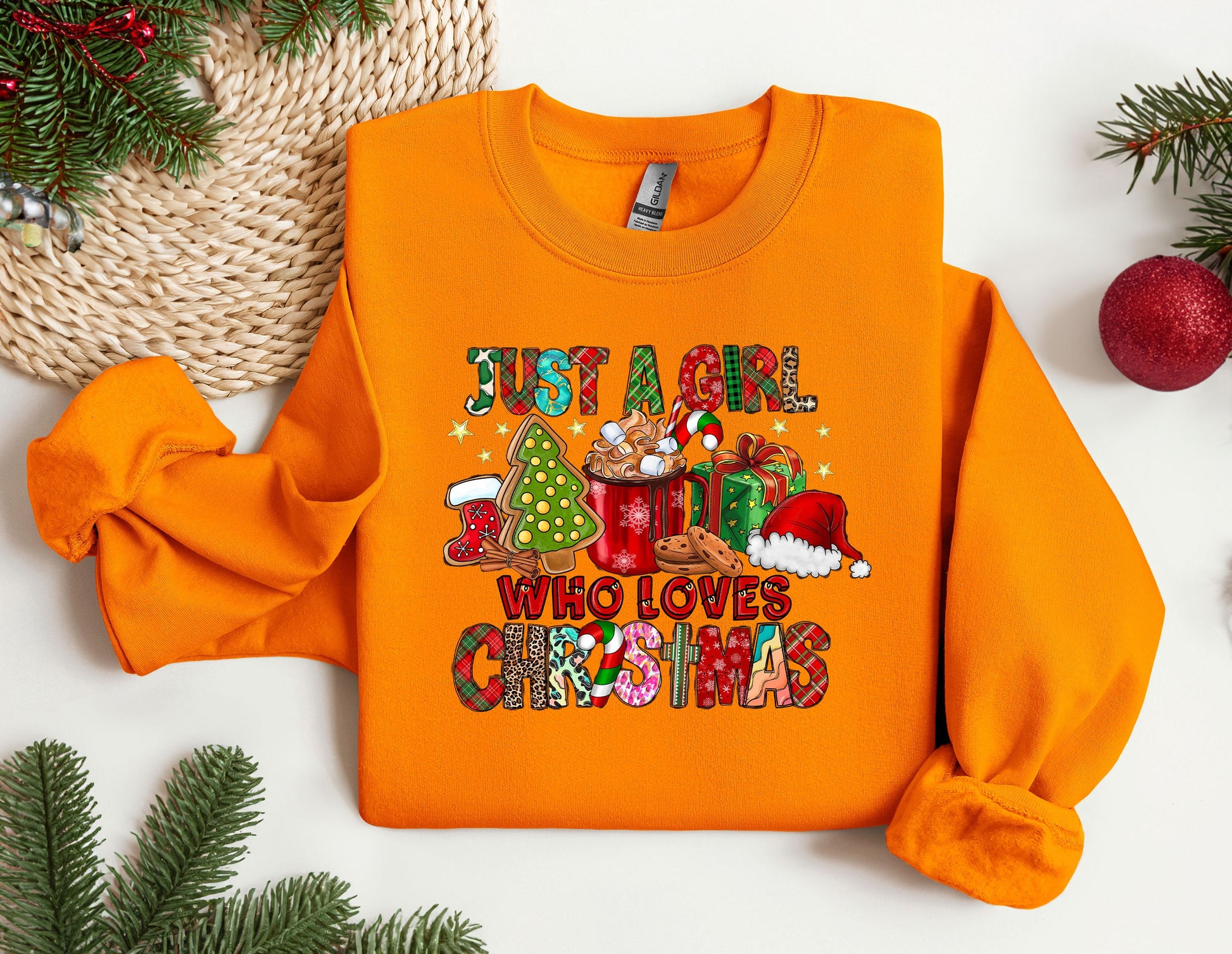 an orange shirt with a christmas message on it