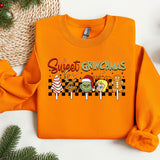 an orange shirt with a cartoon character on it