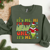 a green christmas sweater with the words it's me, i'm the