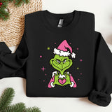 a black shirt with a grin face wearing a santa hat
