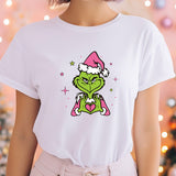 a woman wearing a t - shirt with the grin face on it