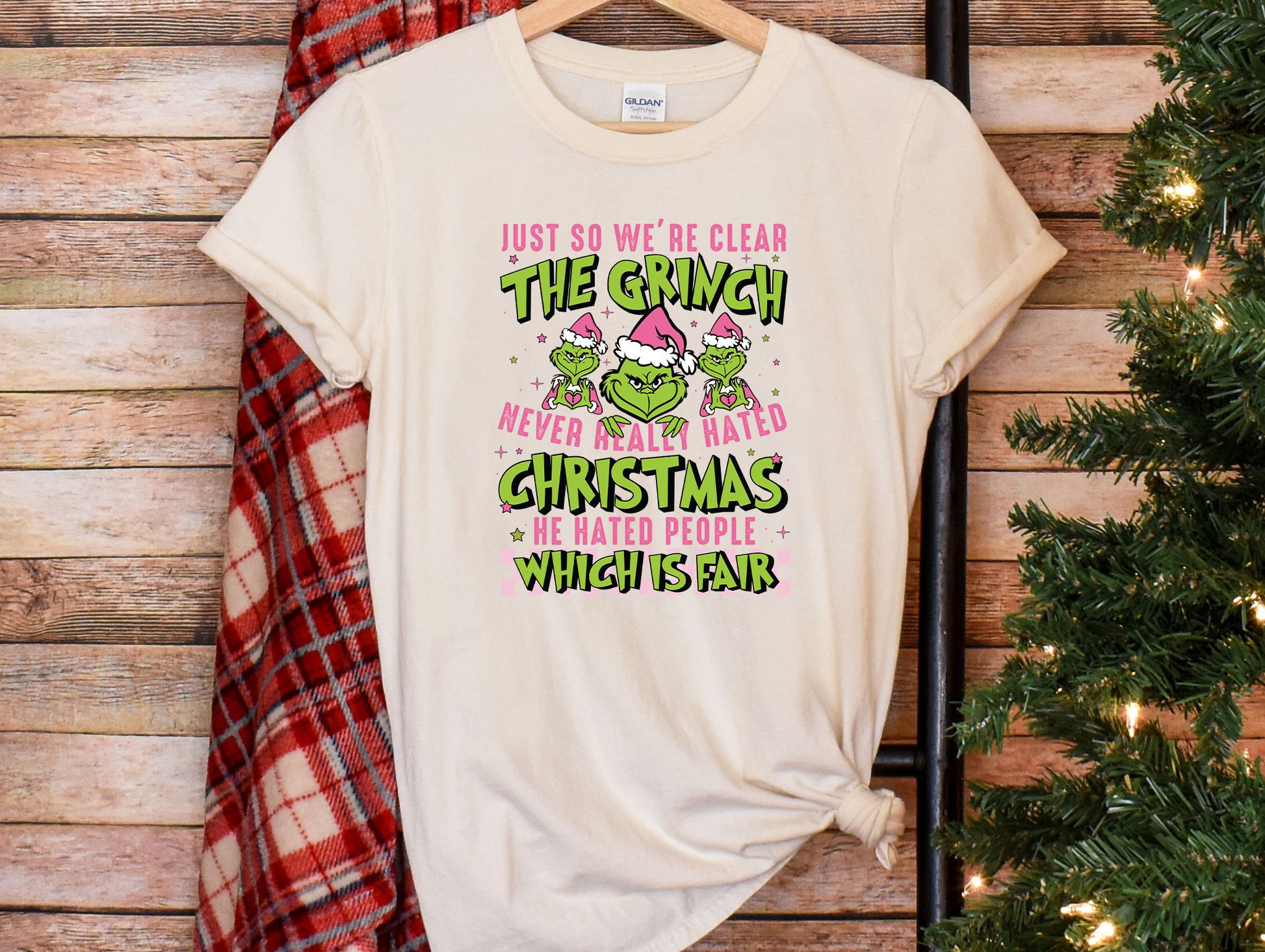 a white t - shirt with a christmas message on it