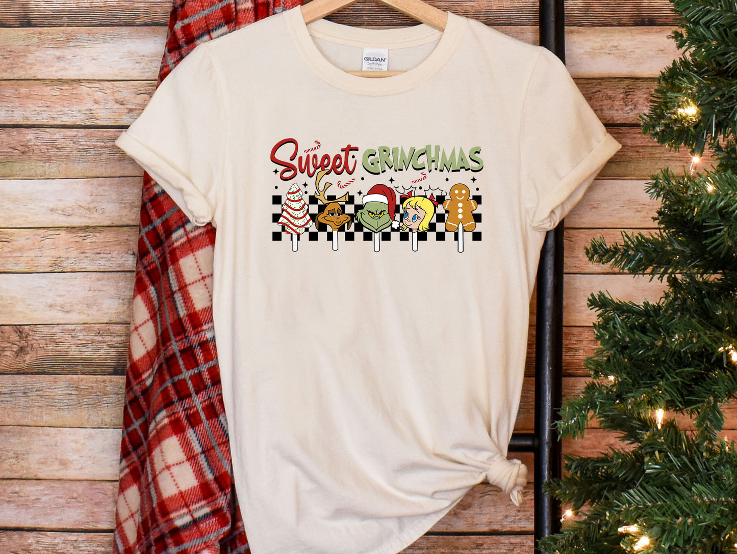 a t - shirt with the words sweet christmas on it