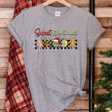 a gray t - shirt with the words sweet snacks on it