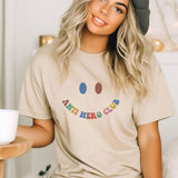 a woman sitting on a bed with a cup of coffee