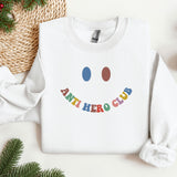 a white sweatshirt with a smiley face on it