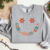a grey sweatshirt with a smile drawn on it