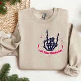 a sweater with a picture of a hand holding two fingers