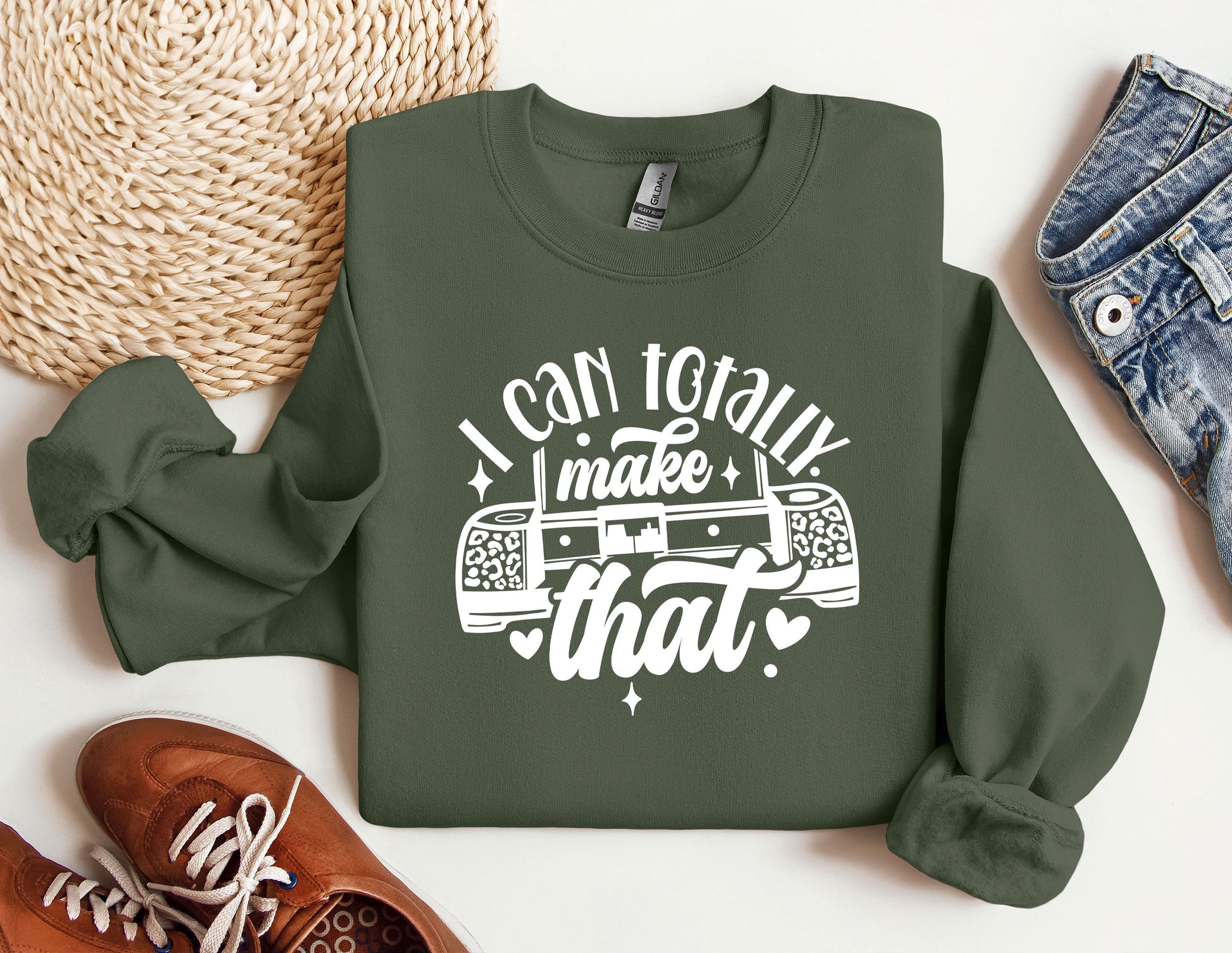 a green sweatshirt that says i can totally make that