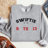 a sweater with the words swiffie on it