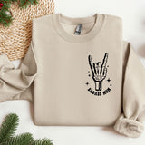 a sweater with a peace sign drawn on it