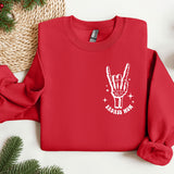 a red sweater with a peace sign on it
