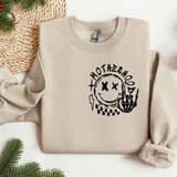 a sweatshirt with the words motherhood printed on it