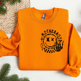 an orange sweatshirt with the words motherhood on it