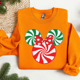 a mickey mouse christmas sweater with candy canes on it