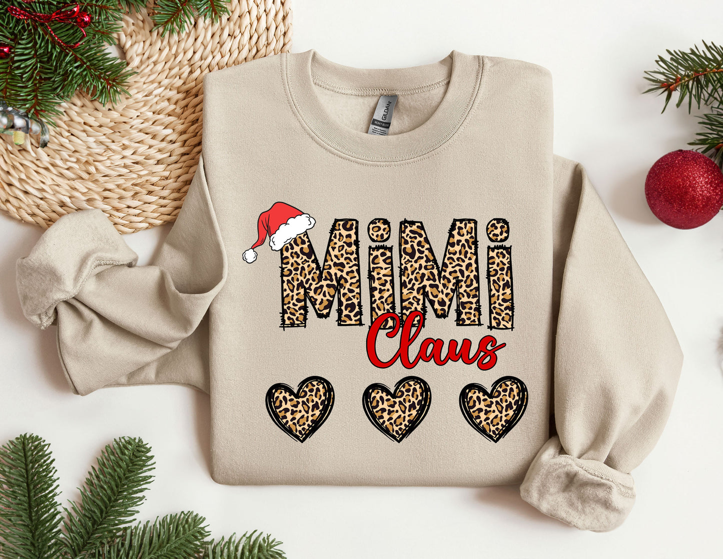 a sweater with the words mimi claus on it