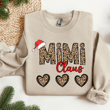 a sweater with the words mimi claus on it