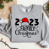 a gray sweatshirt with a santa hat on it