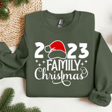 a green sweatshirt with a santa hat on it