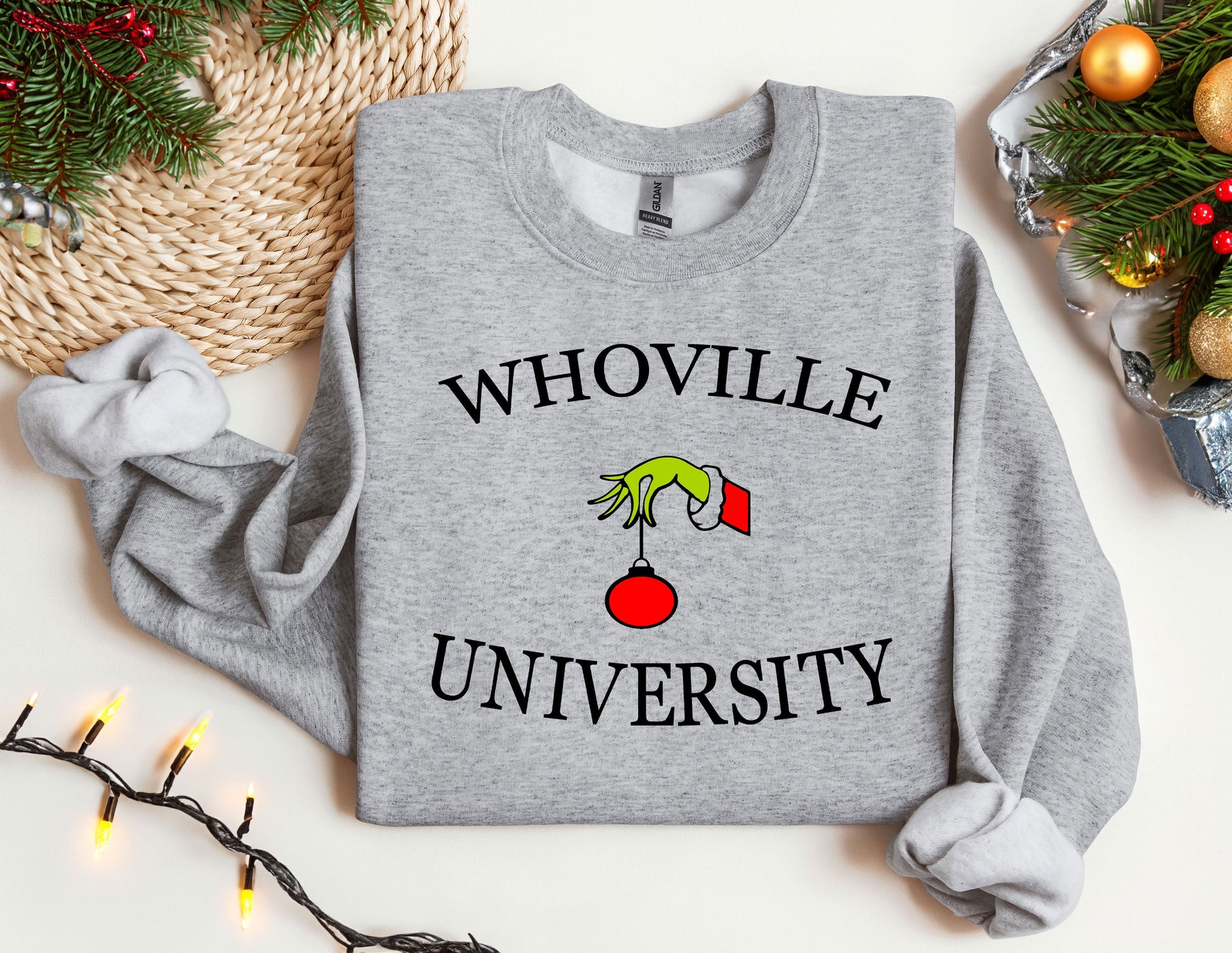 a grey sweatshirt with the words whoville university on it