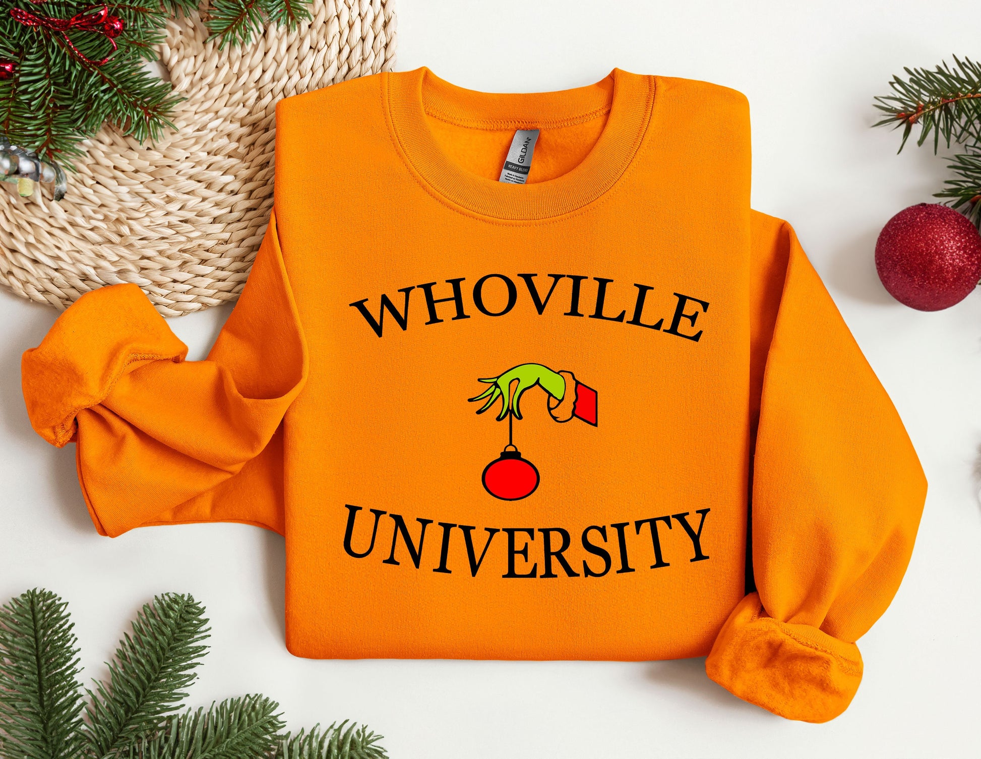 an orange sweatshirt with the words whoville university on it