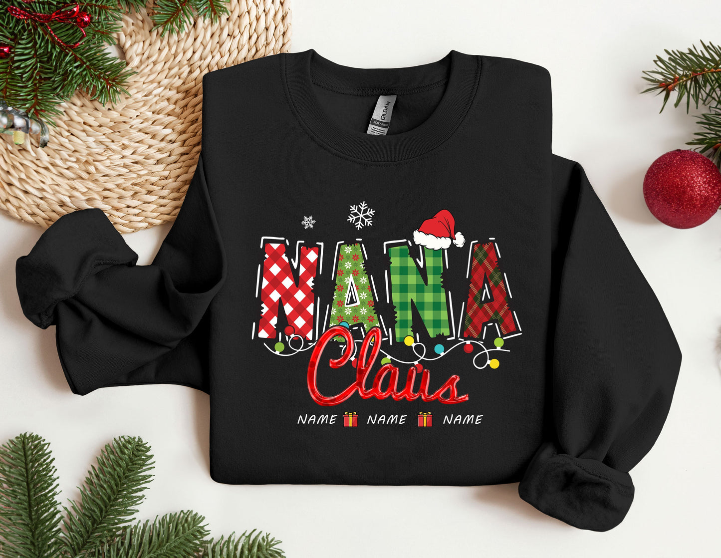 a black shirt with the word mama claus on it