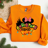 an orange sweatshirt with a mickey mouse christmas squad on it