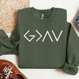 a green sweatshirt with the word gvg on it next to a pair of