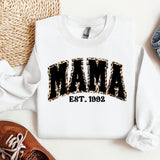a white sweatshirt with the word mama printed on it