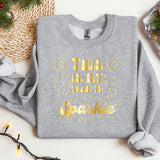 a grey sweatshirt with gold lettering on it