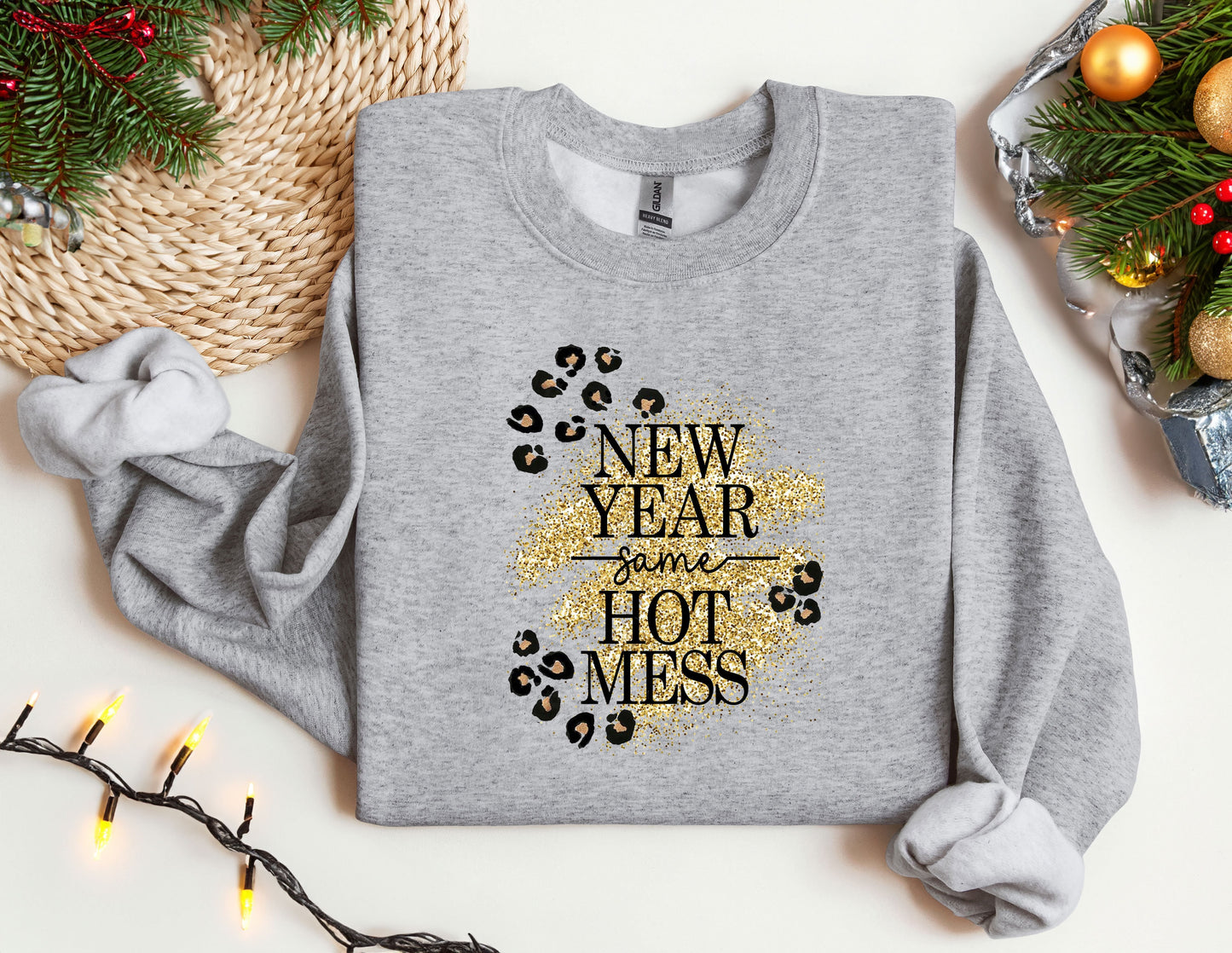 a gray sweater with a new year message on it