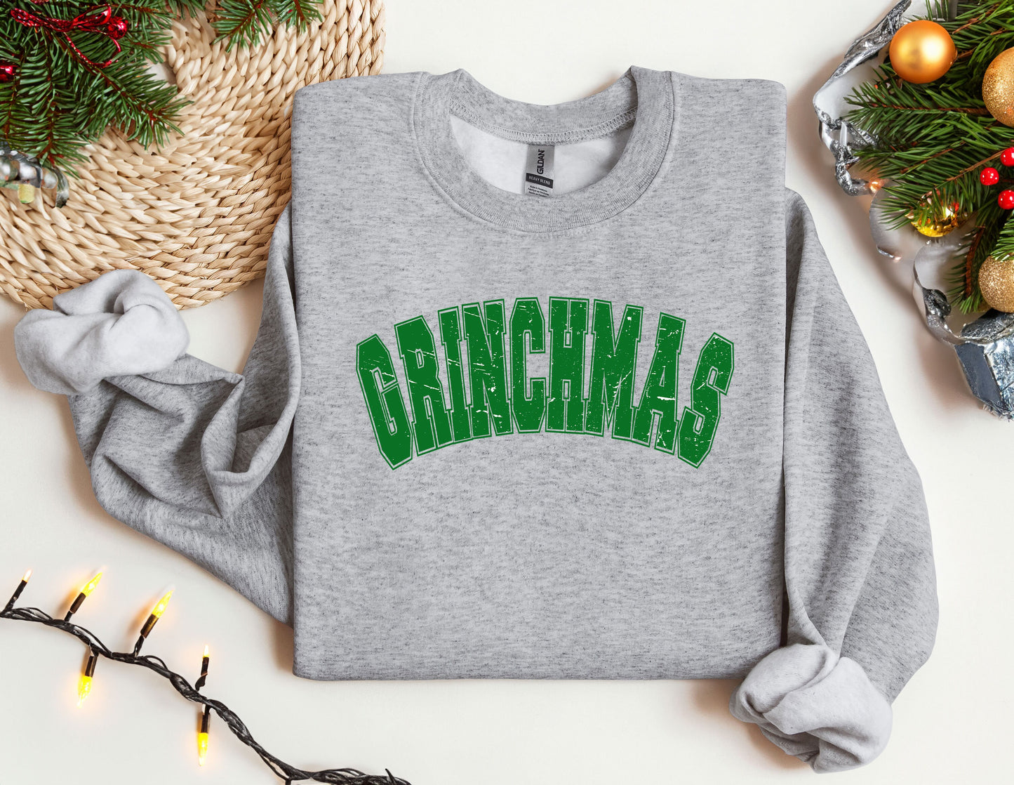 a grey sweatshirt with the word grinnas on it