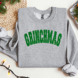 a grey sweatshirt with the word grinnas on it