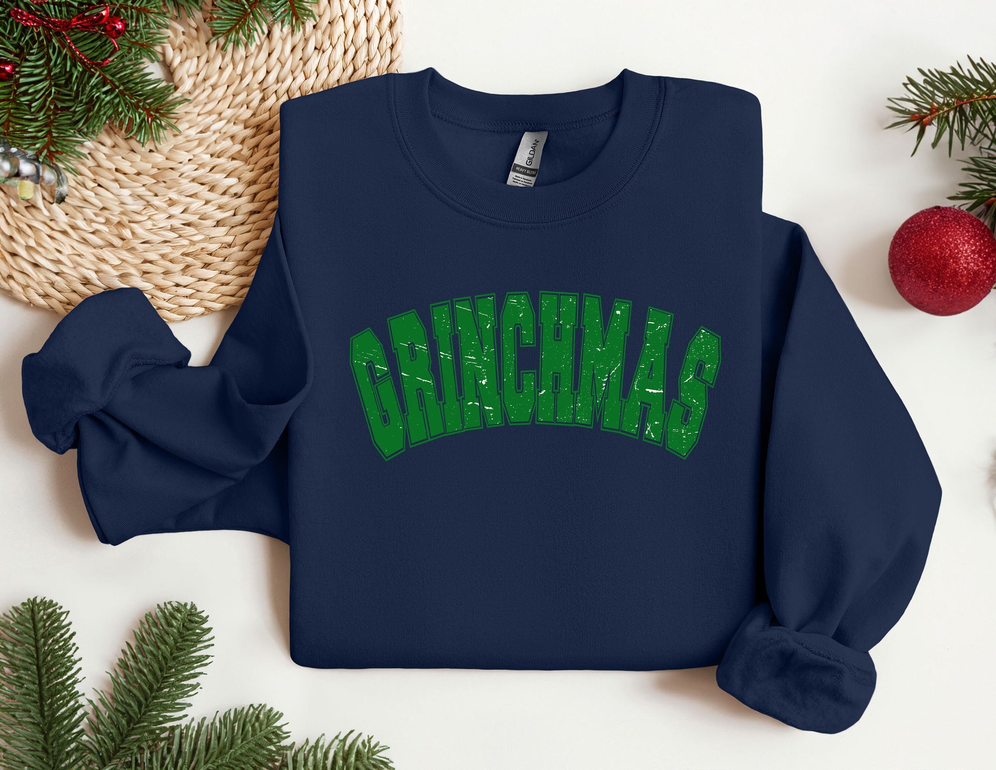 a blue sweatshirt with the word christmas on it