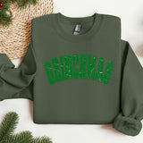 a green sweatshirt with the word grinnas on it