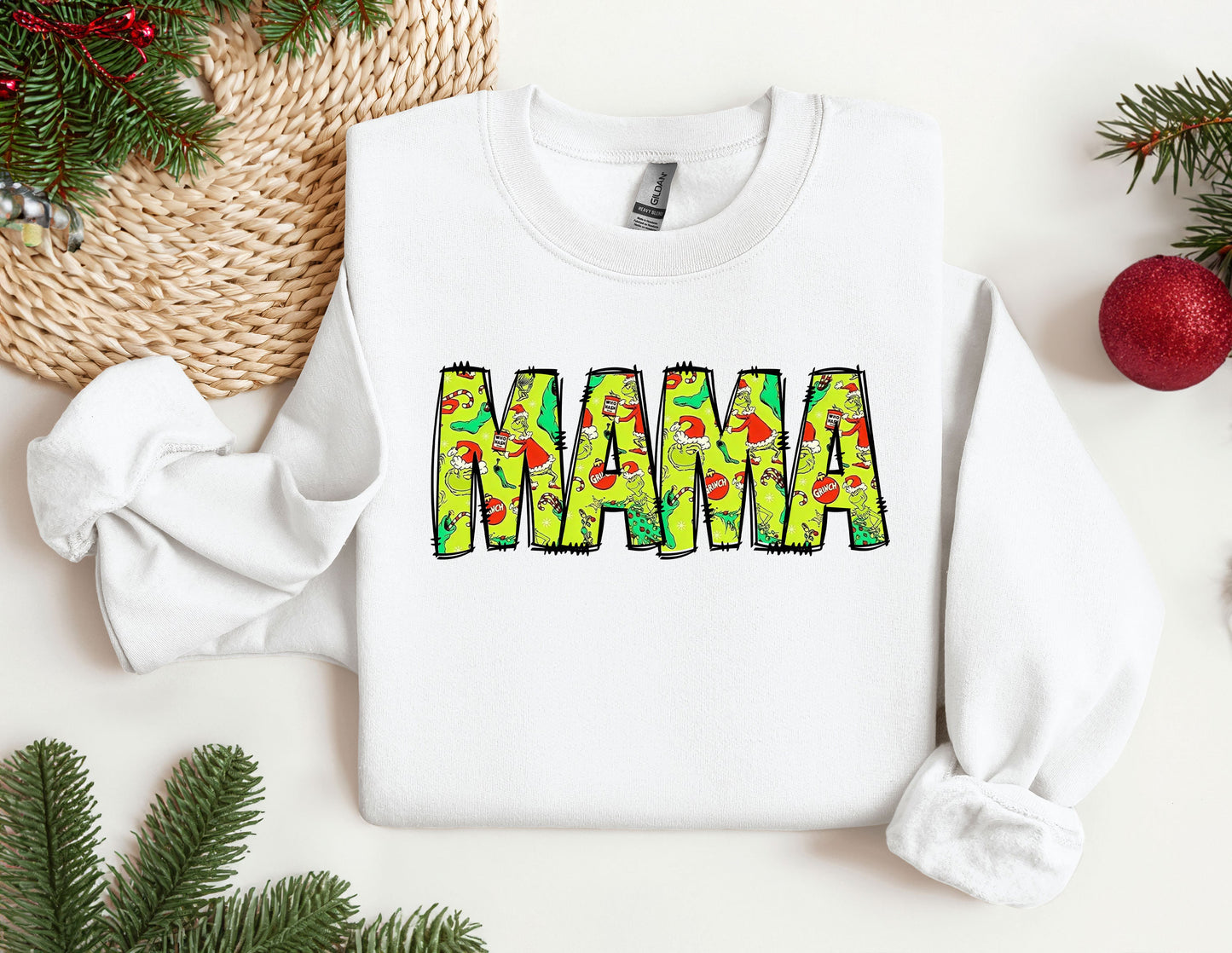 a white sweatshirt with the word mama printed on it