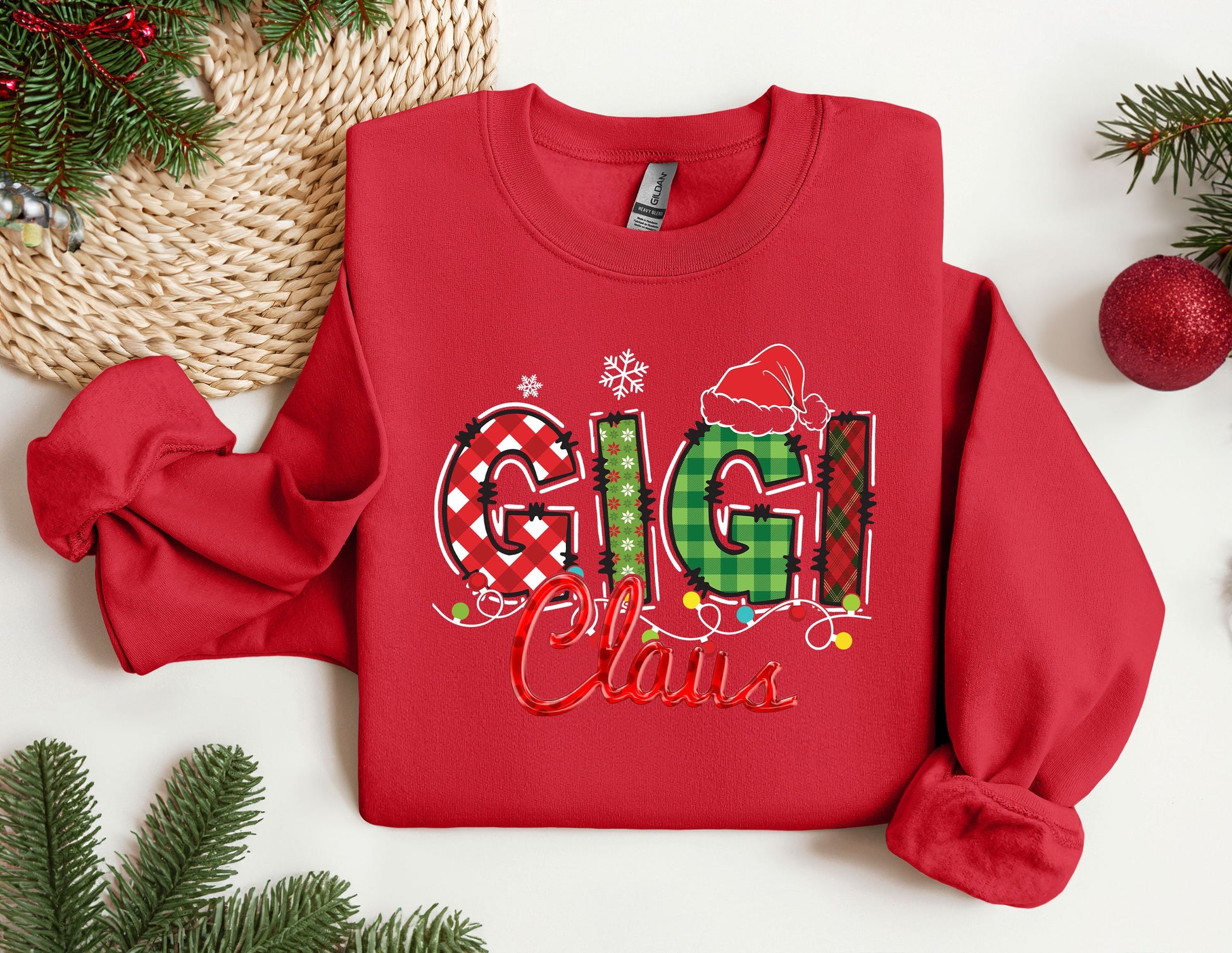 a red sweater with the word ugly claus on it