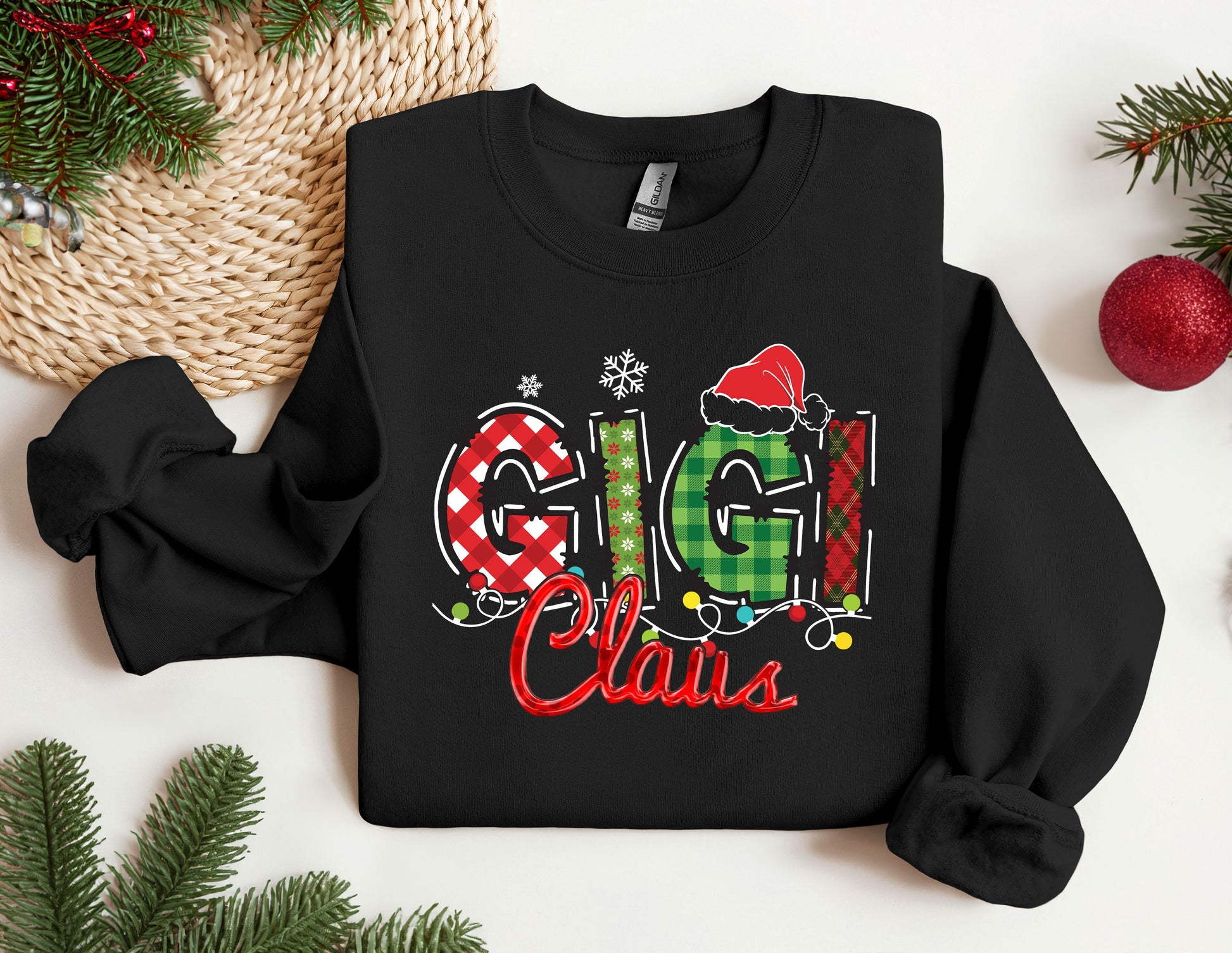 a black sweatshirt with the word ggi claus printed on it