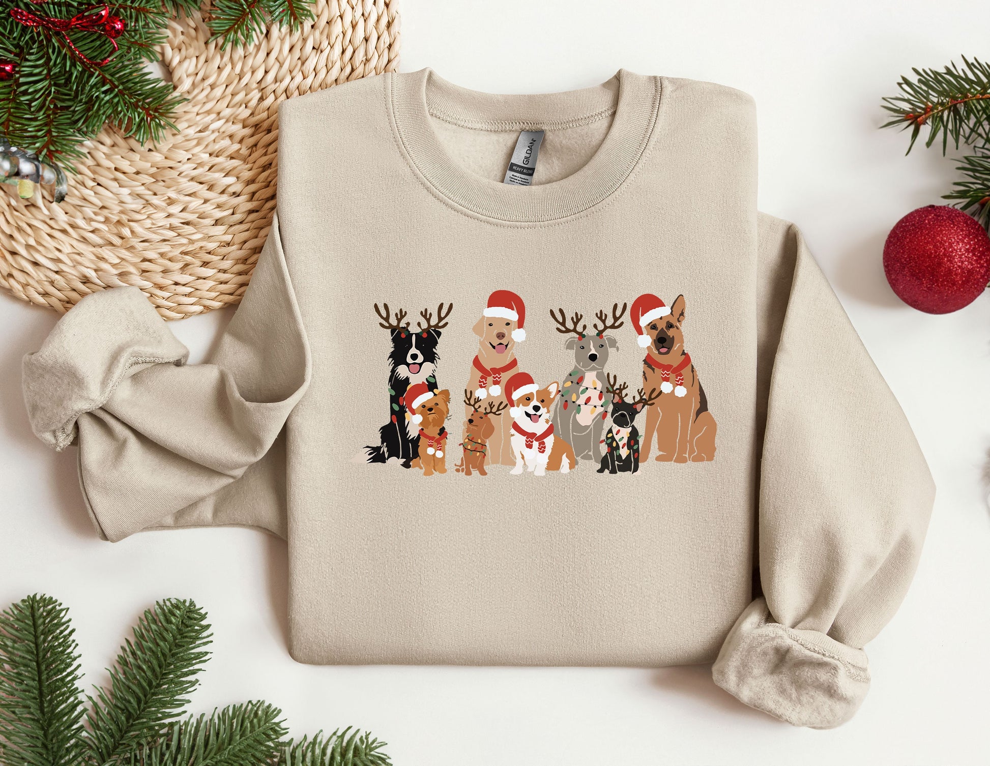 a group of dogs wearing christmas sweaters on top of a table