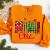 an orange shirt with the word mum claus on it