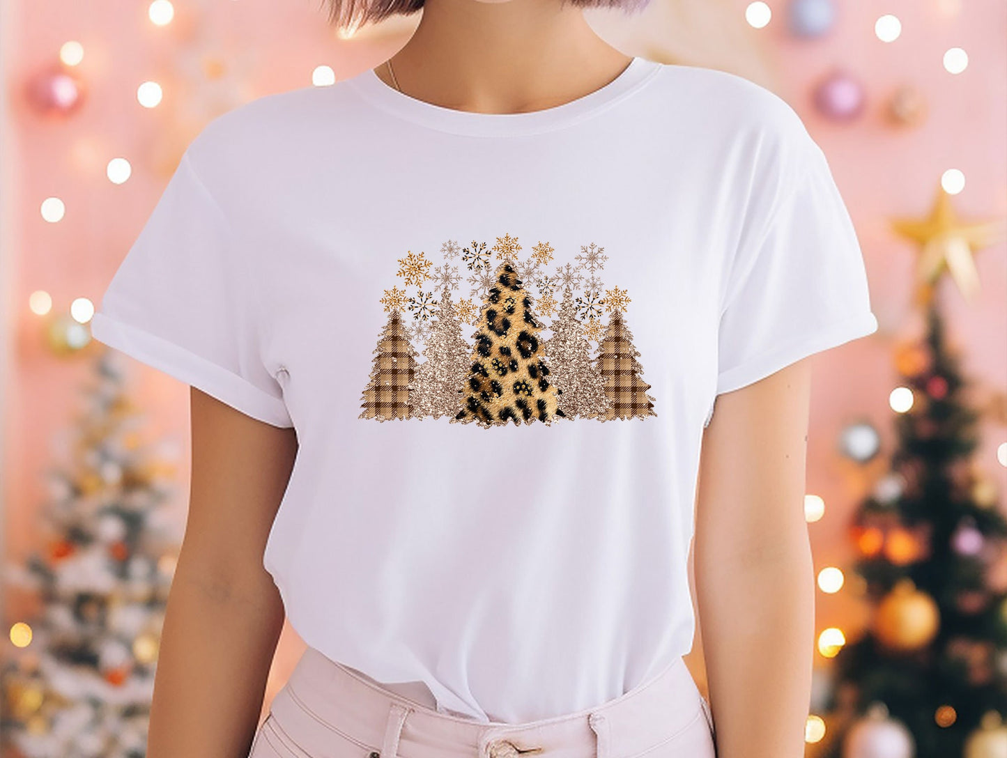 a woman wearing a t - shirt with a christmas tree on it