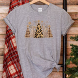 a gray shirt with a leopard print on it