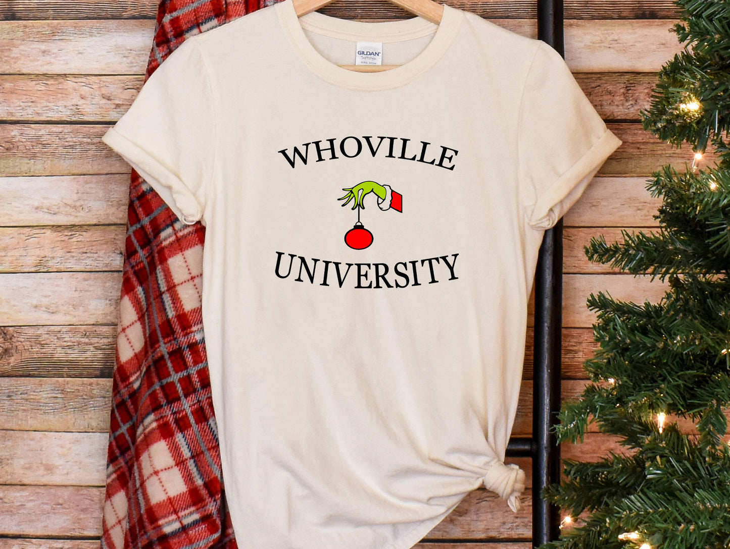 a t - shirt that says whoville university on it