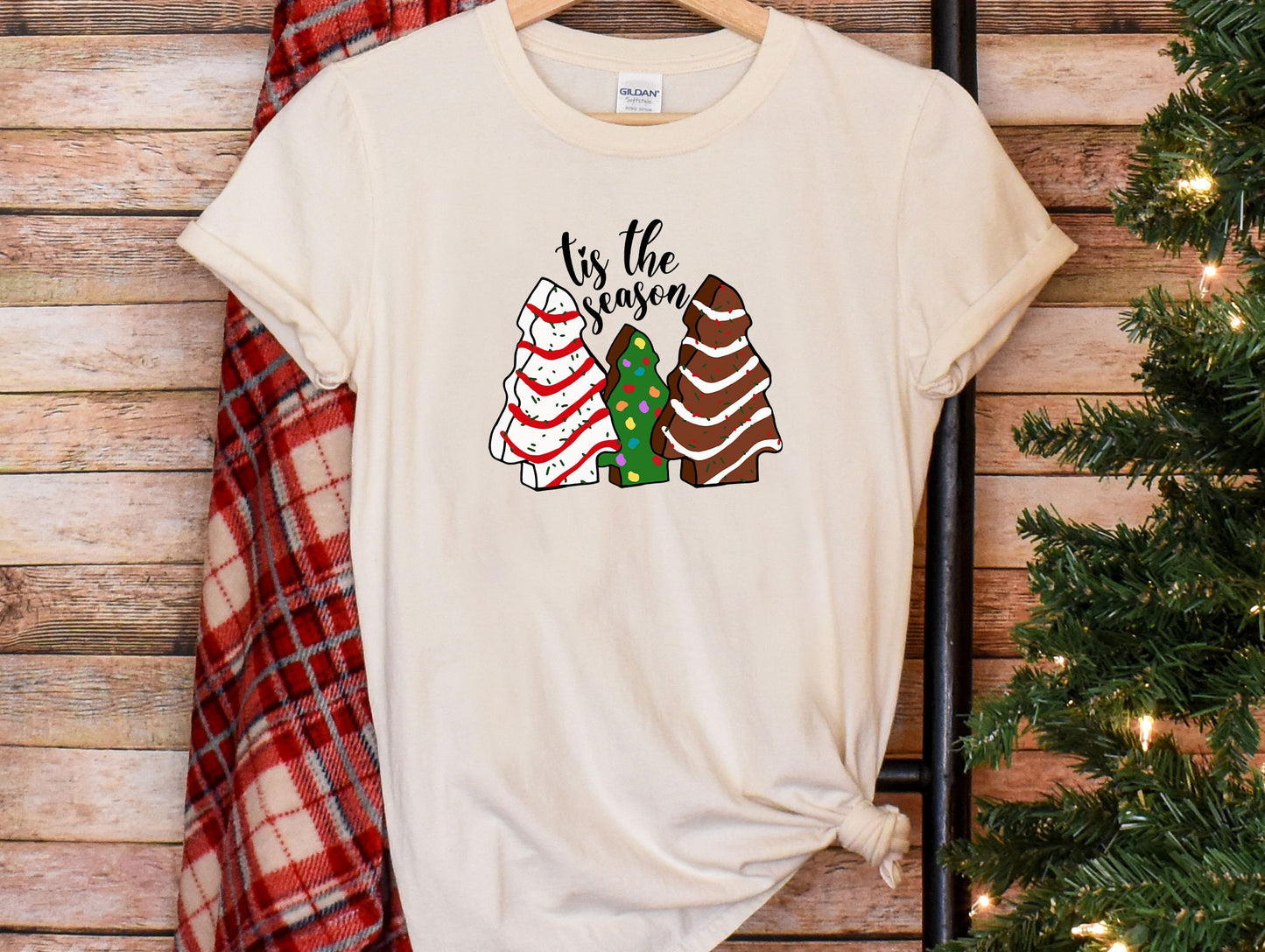 a t - shirt that says tis the season with christmas trees